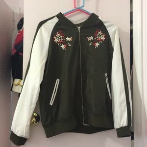 Green jacket with flower pattern